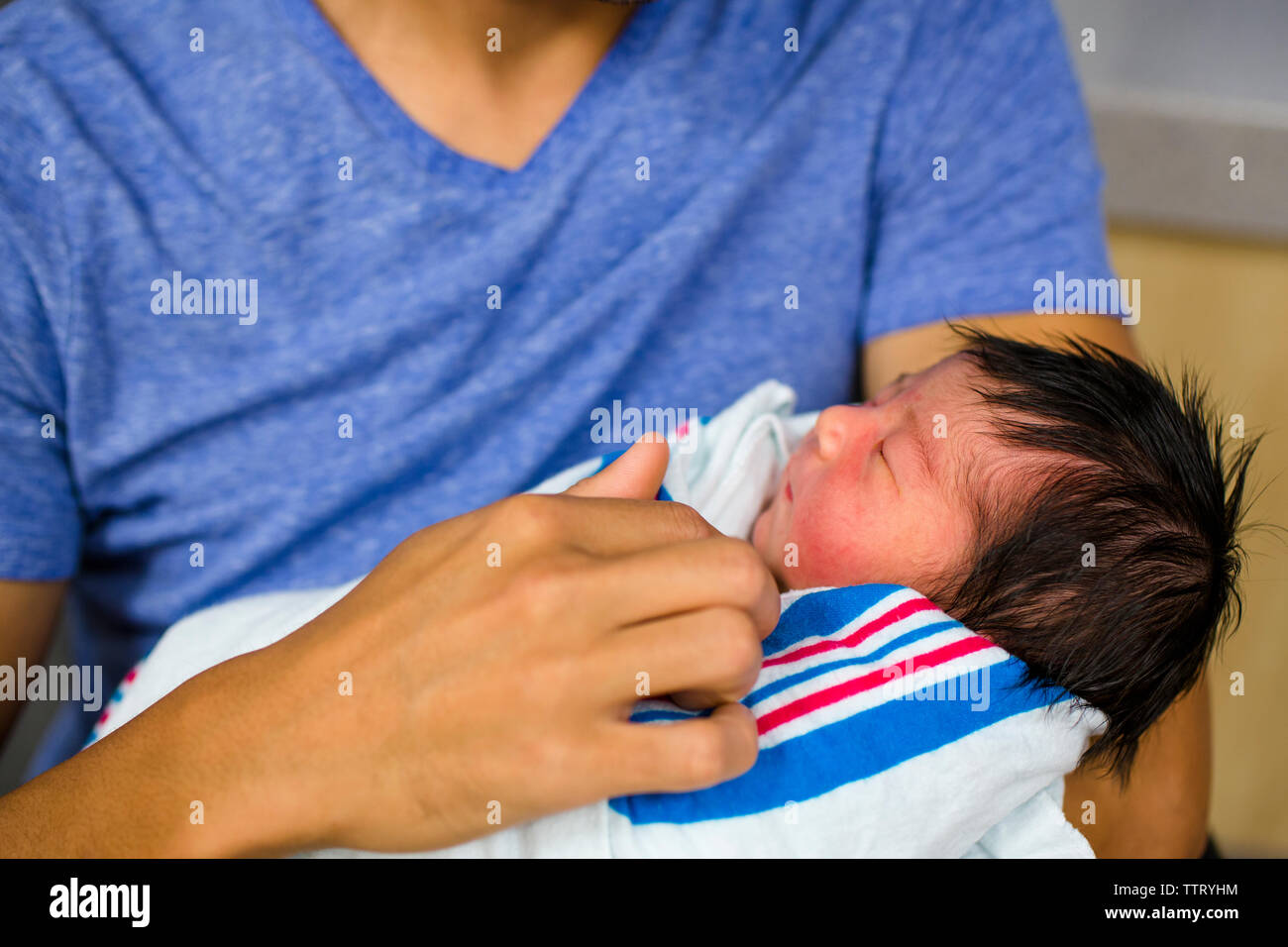 Cradled High Resolution Stock Photography And Images Alamy