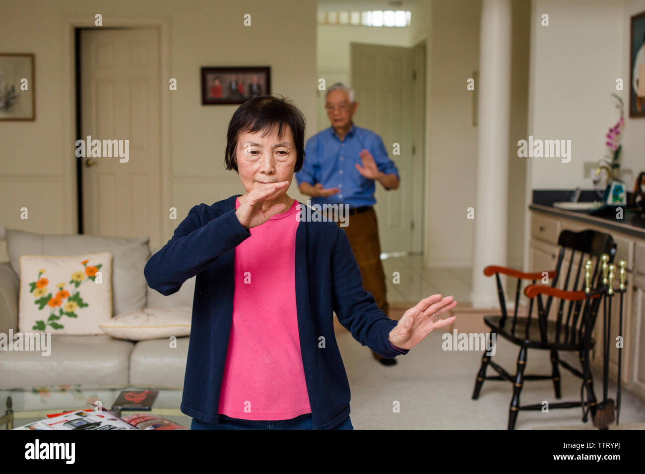 Asian man woman tai chi senior hi-res stock photography and images - Alamy