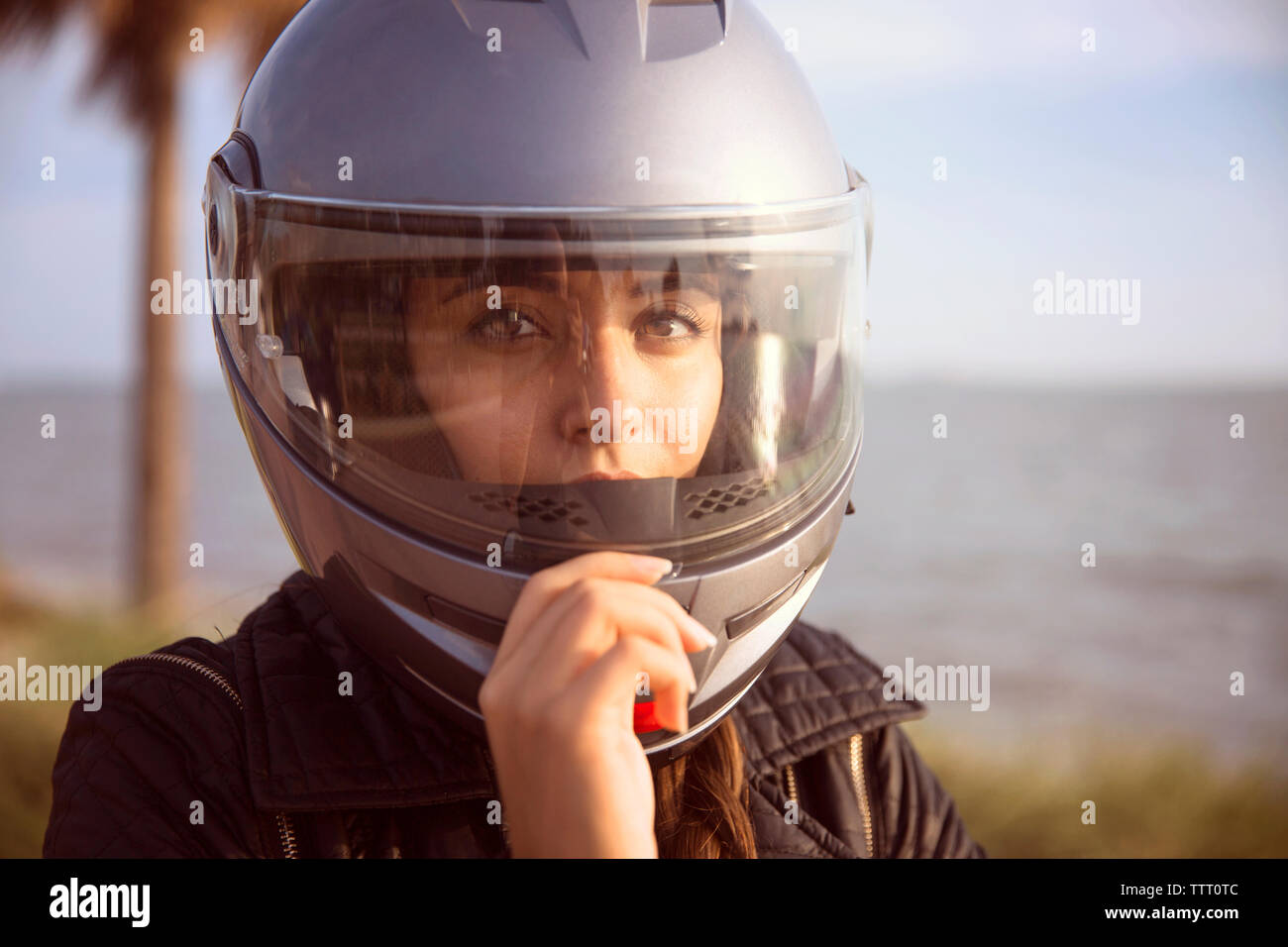 Woman wearing helmet hi-res stock photography and images - Alamy