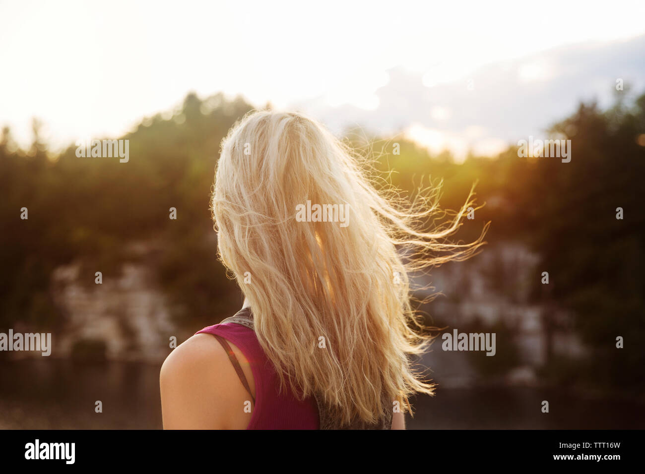 Blond woman rear view hi-res stock photography and images - Alamy