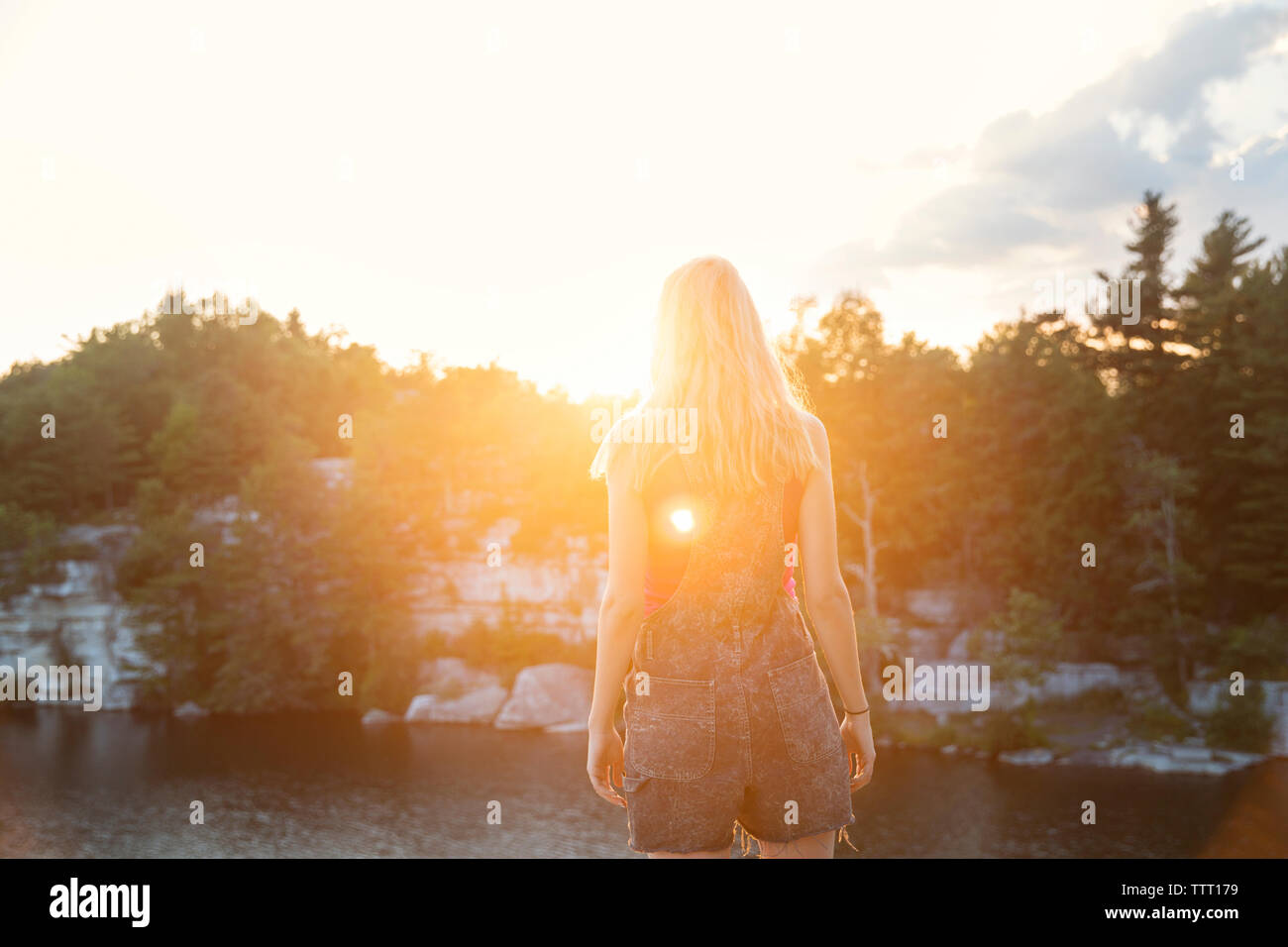 Blond woman rear view hi-res stock photography and images - Alamy