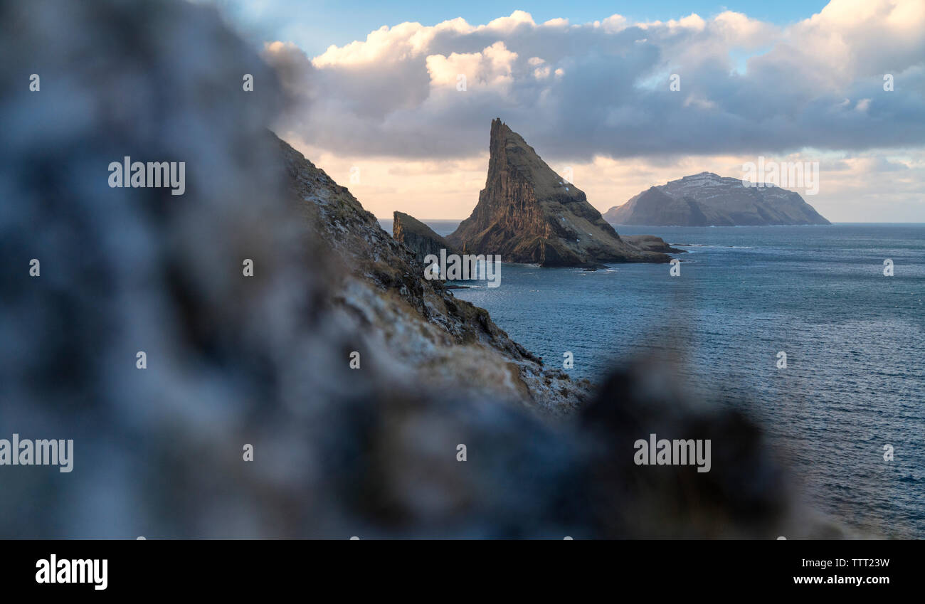 Sunset over Drangarnir and Tindholmur islet, Vagar Island, Faroe ...