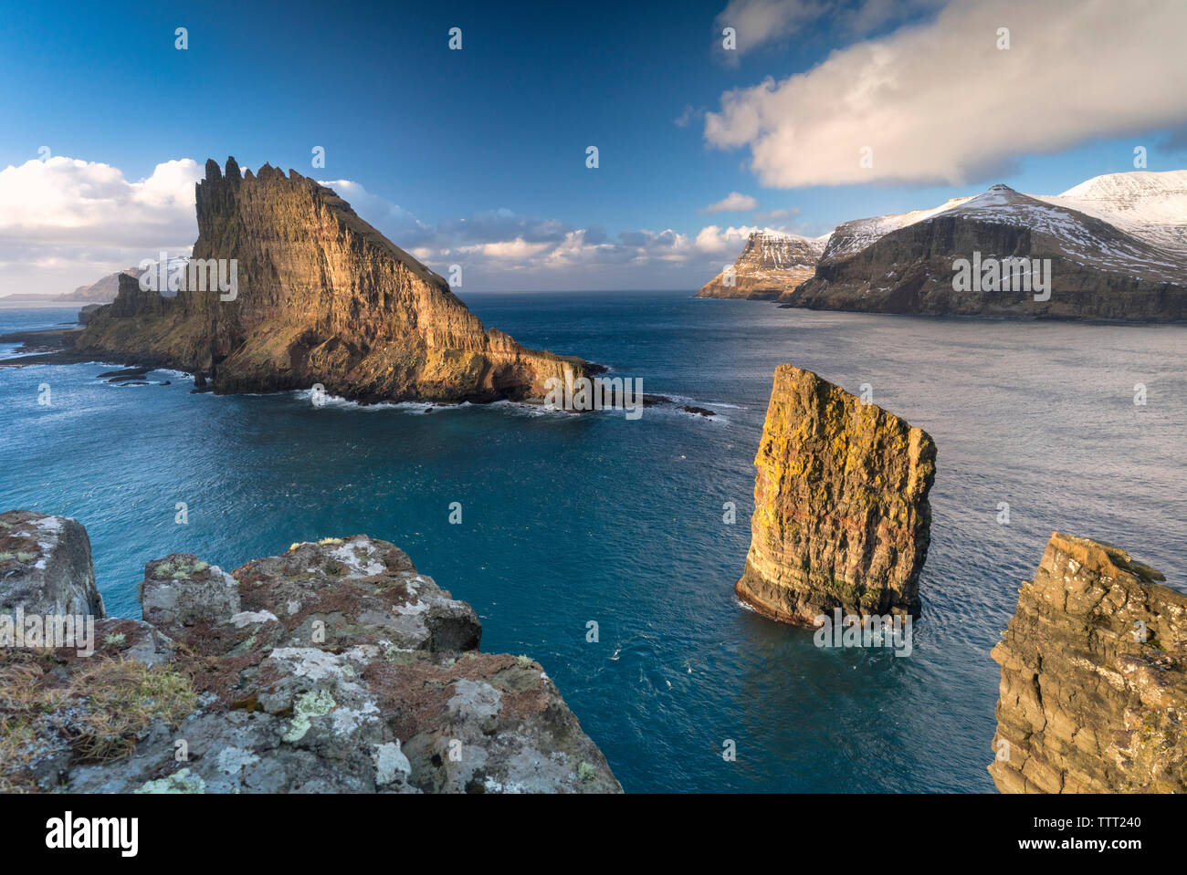 Sunset over Drangarnir and Tindholmur islet, Vagar Island, Faroe ...