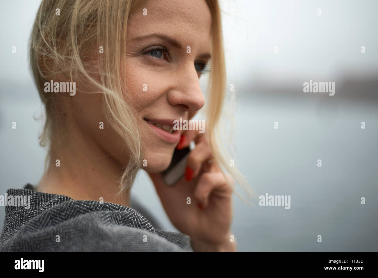 Close-up of businesswoman talking on mobile phone Stock Photo