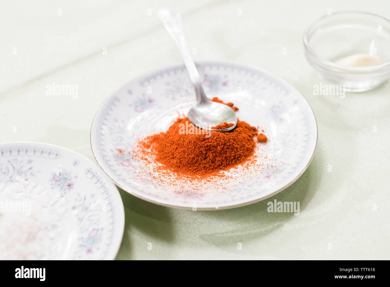 Sweet paprika on a plate, preparation of canadian mojo Stock Photo