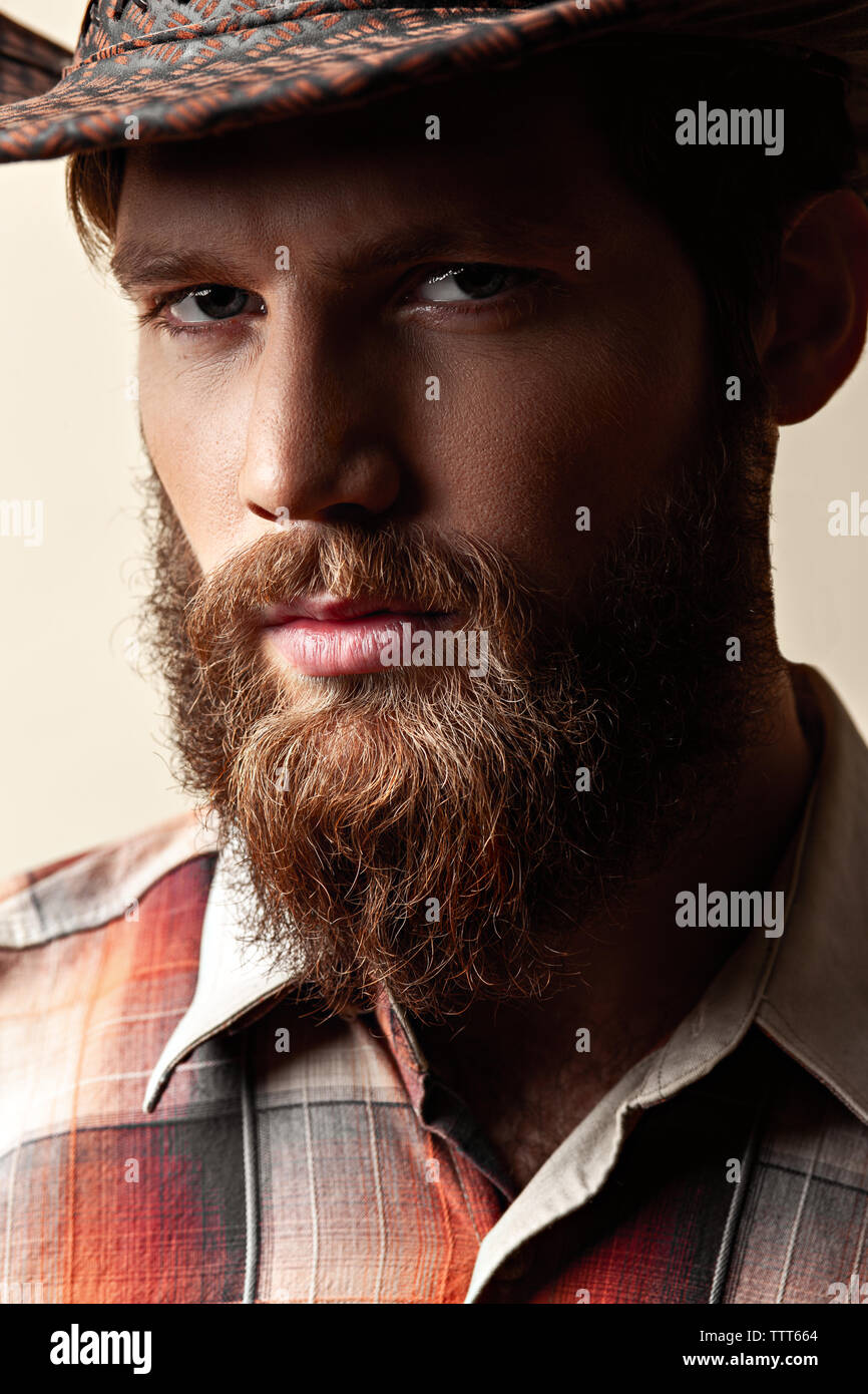 Young handsome man in a cowboy hat Stock Photo