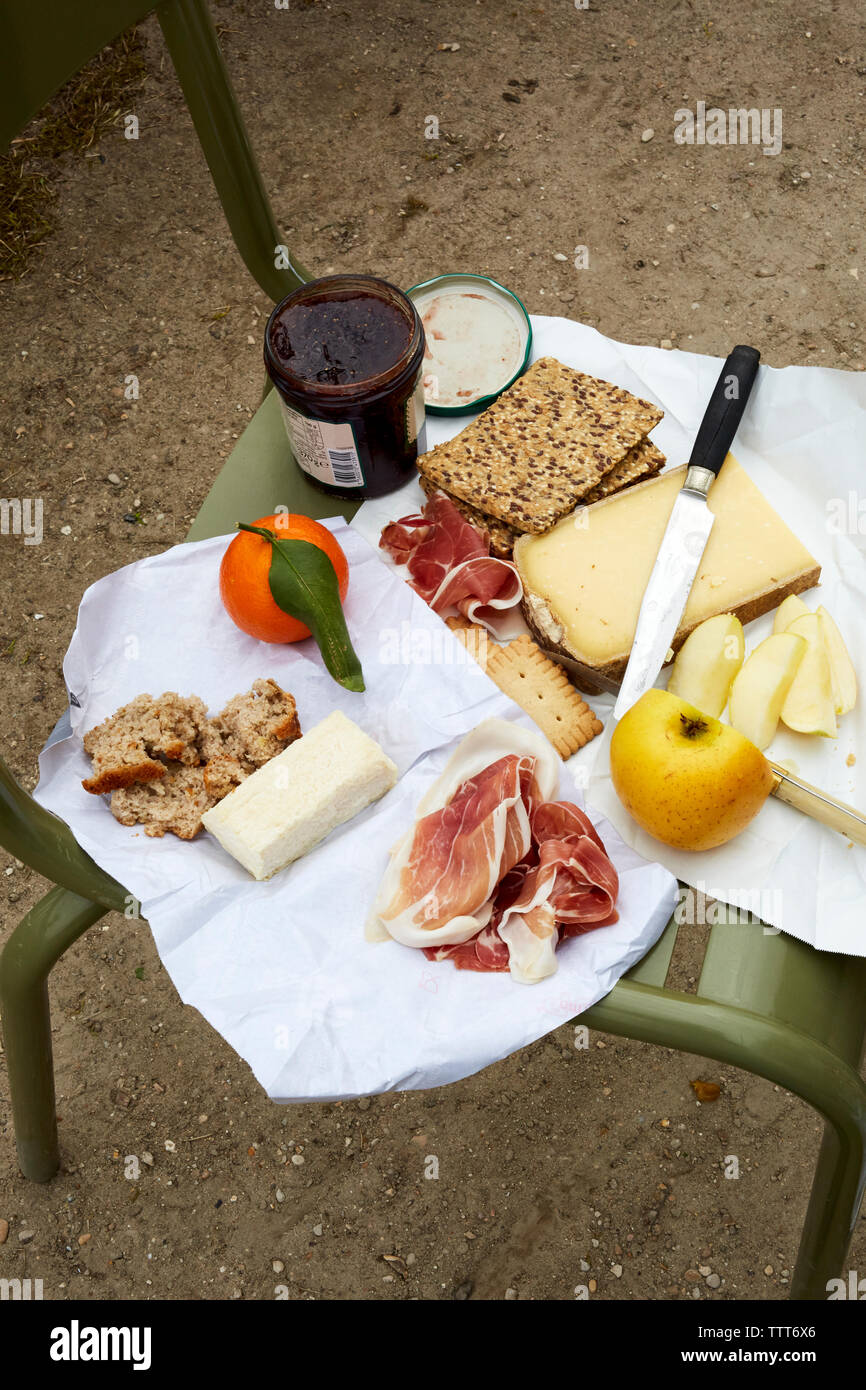 High angle view of food on metal chair outdoors Stock Photo Alamy