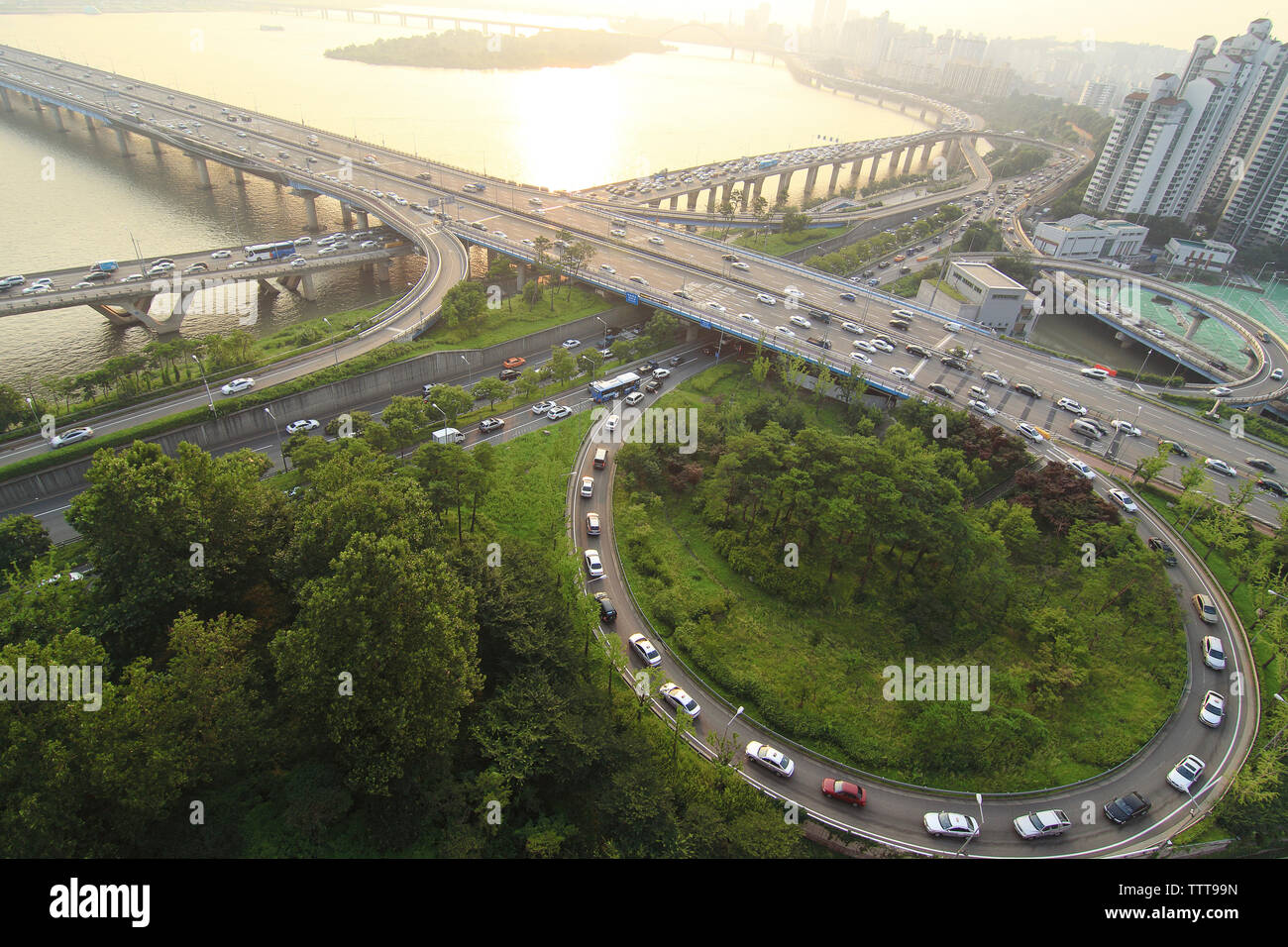 Aerial view of cars moving on Mapo Bridge over Han River during sunset Stock Photo