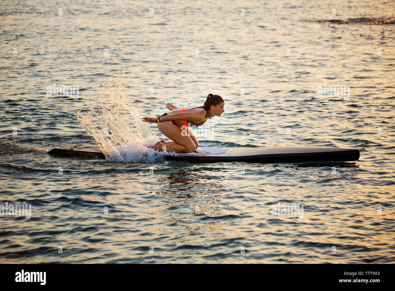Kneeling in water hi-res stock photography and images - Alamy