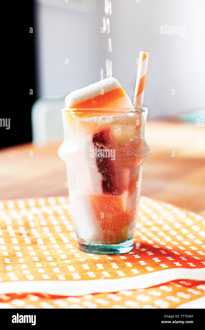 Close-up of flavored ice cubes in glass Stock Photo