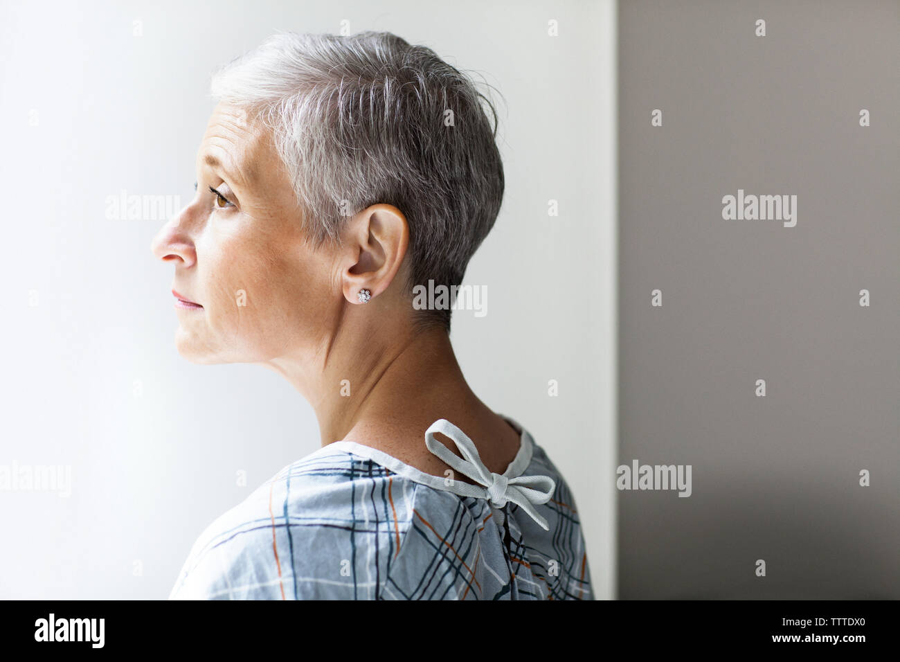 Mature woman side view thoughtful hi-res stock photography and images ...