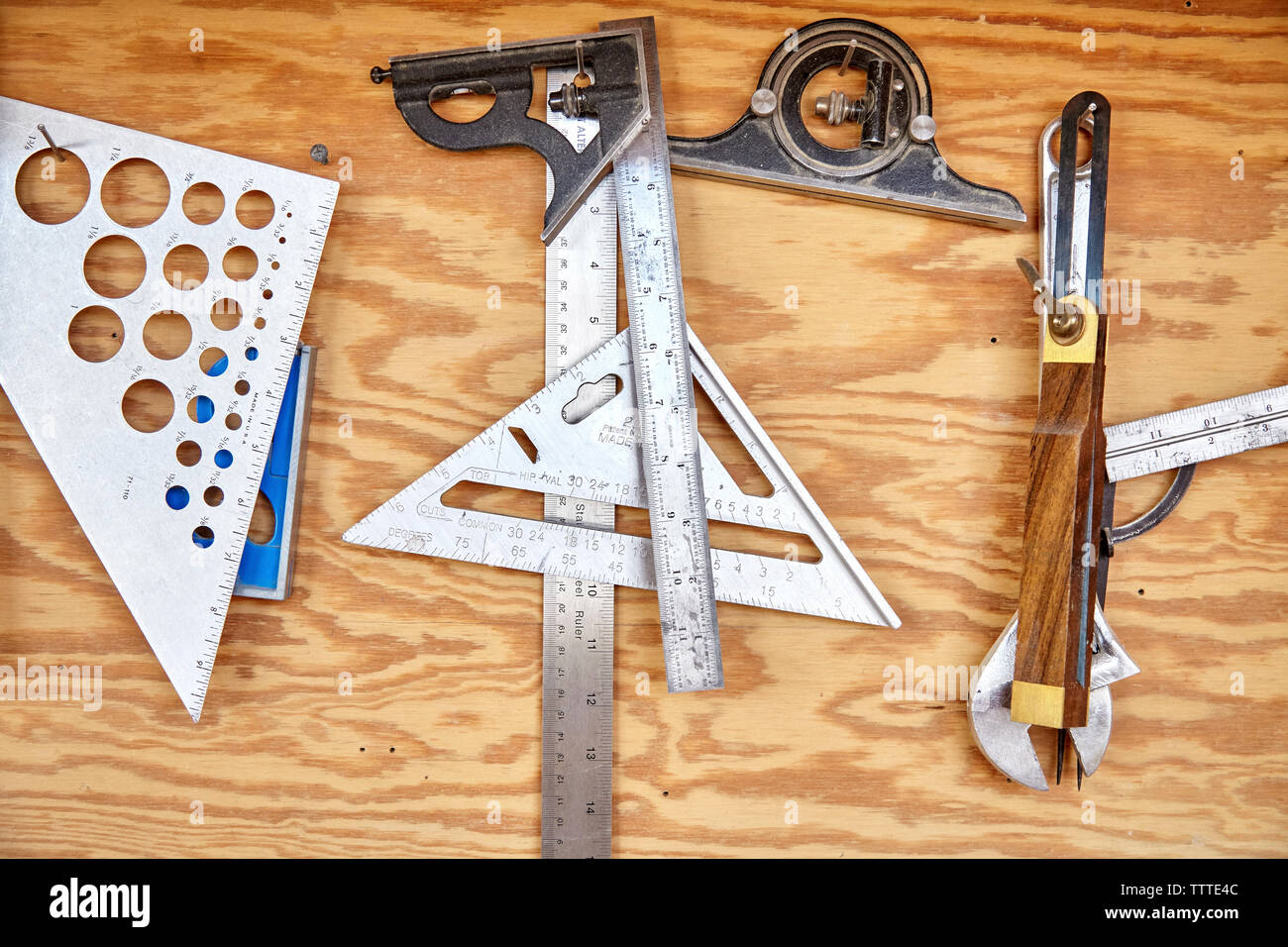 Instrument of measurement on workbench at carpentry workshop Stock Photo