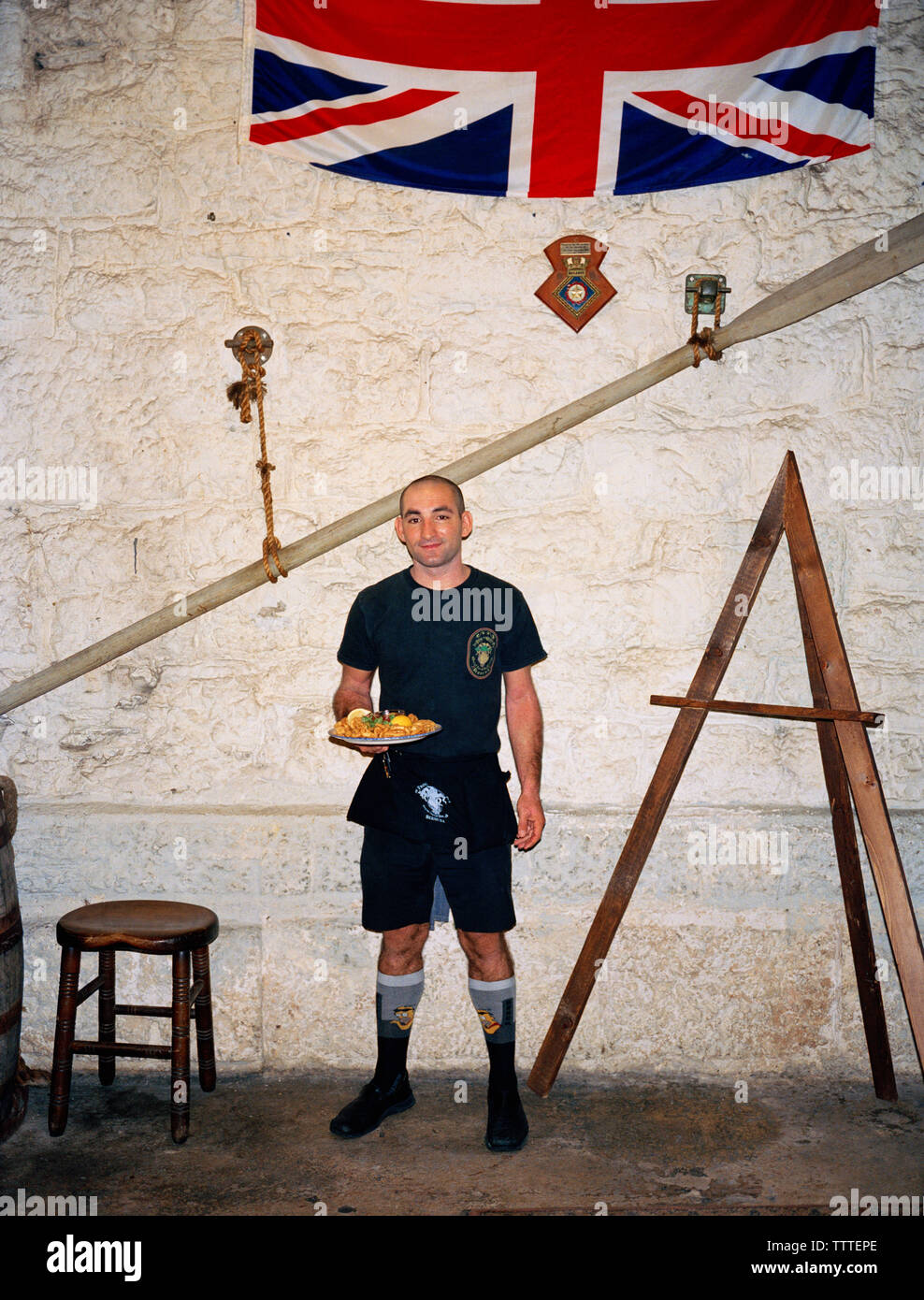 BERMUDA, Frog and Onion Restaurant, portrait of waiter in restaurant
