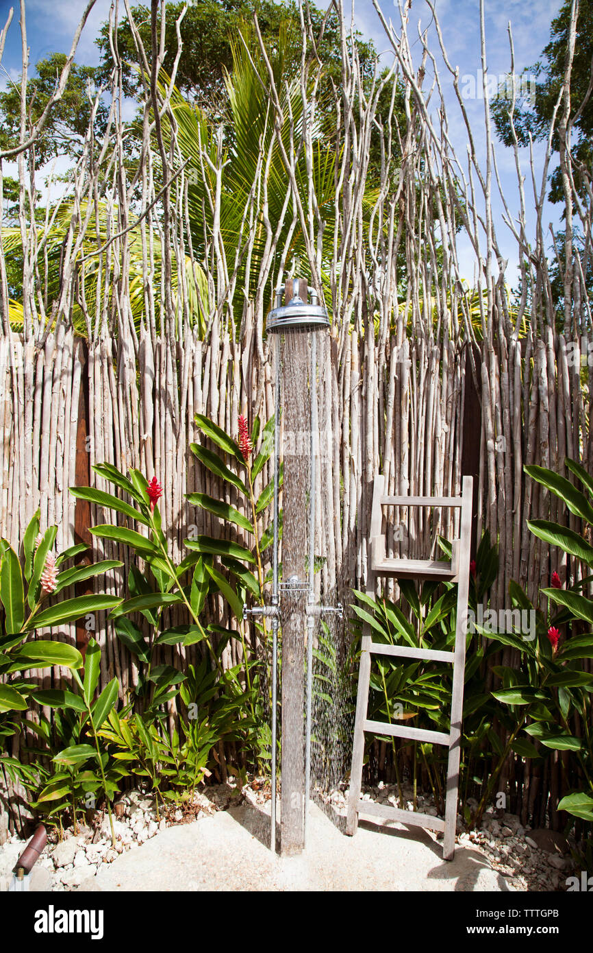 JAMAICA, Oracabessa. Outdoor shower at the Goldeneye Hotel and Resort