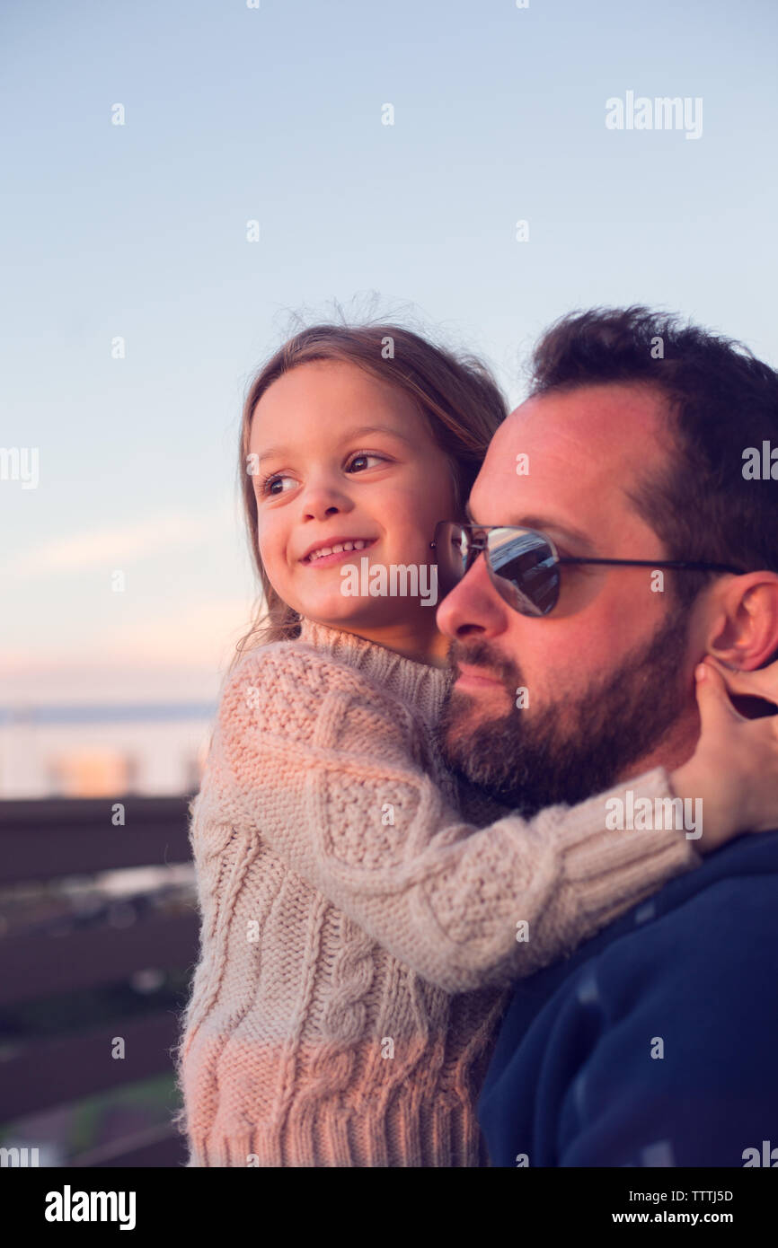 Father and daughter share a loving, affectionate moment. Stock Photo