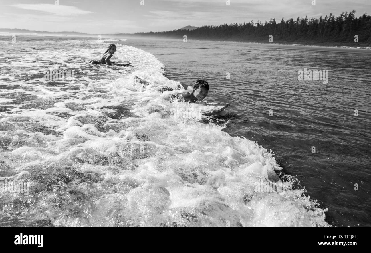 Black children in the ocean hi-res stock photography and images - Alamy