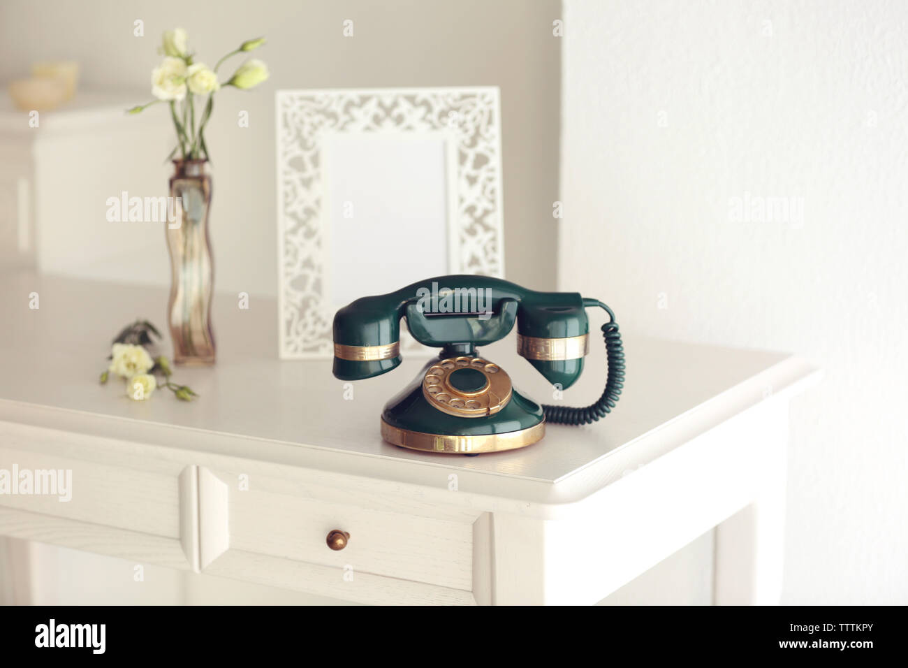 Vintage telephone in interior Stock Photo - Alamy