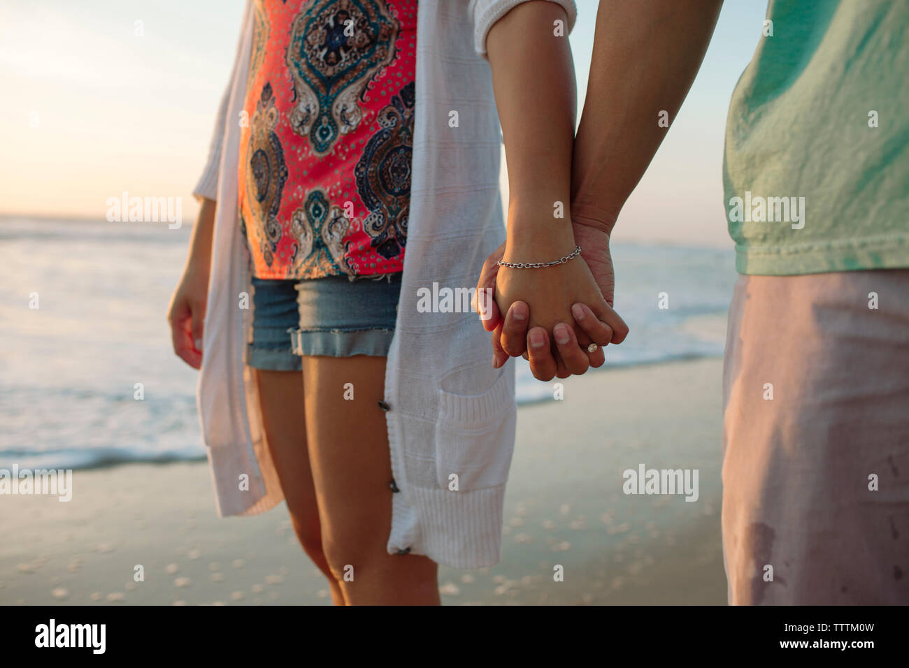 Indian couple holding hands hi-res stock photography and images - Alamy