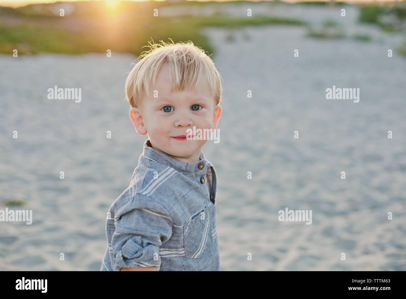 Portrait of cute boy at beach Stock Photo