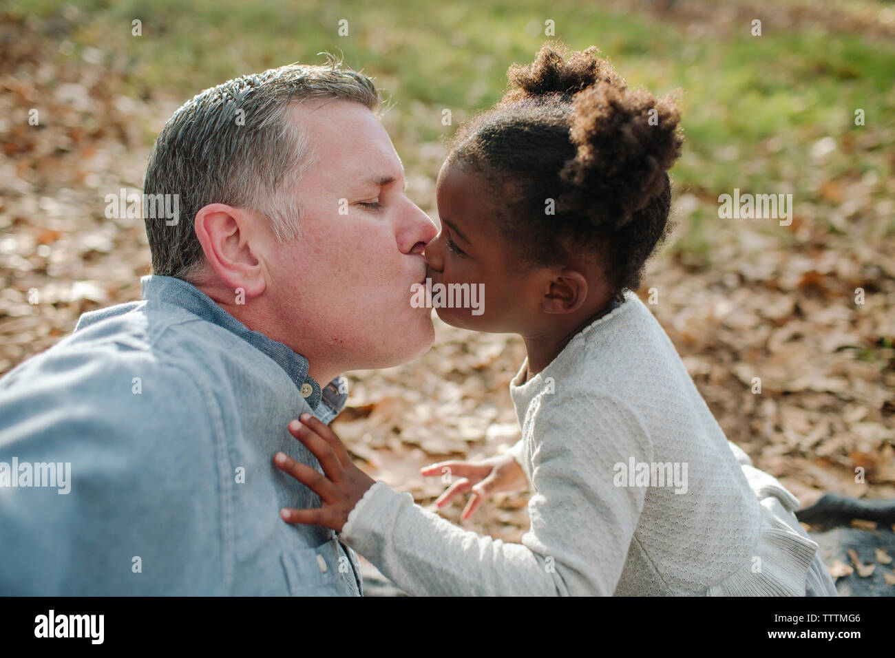 Old Man Young Girl Kiss