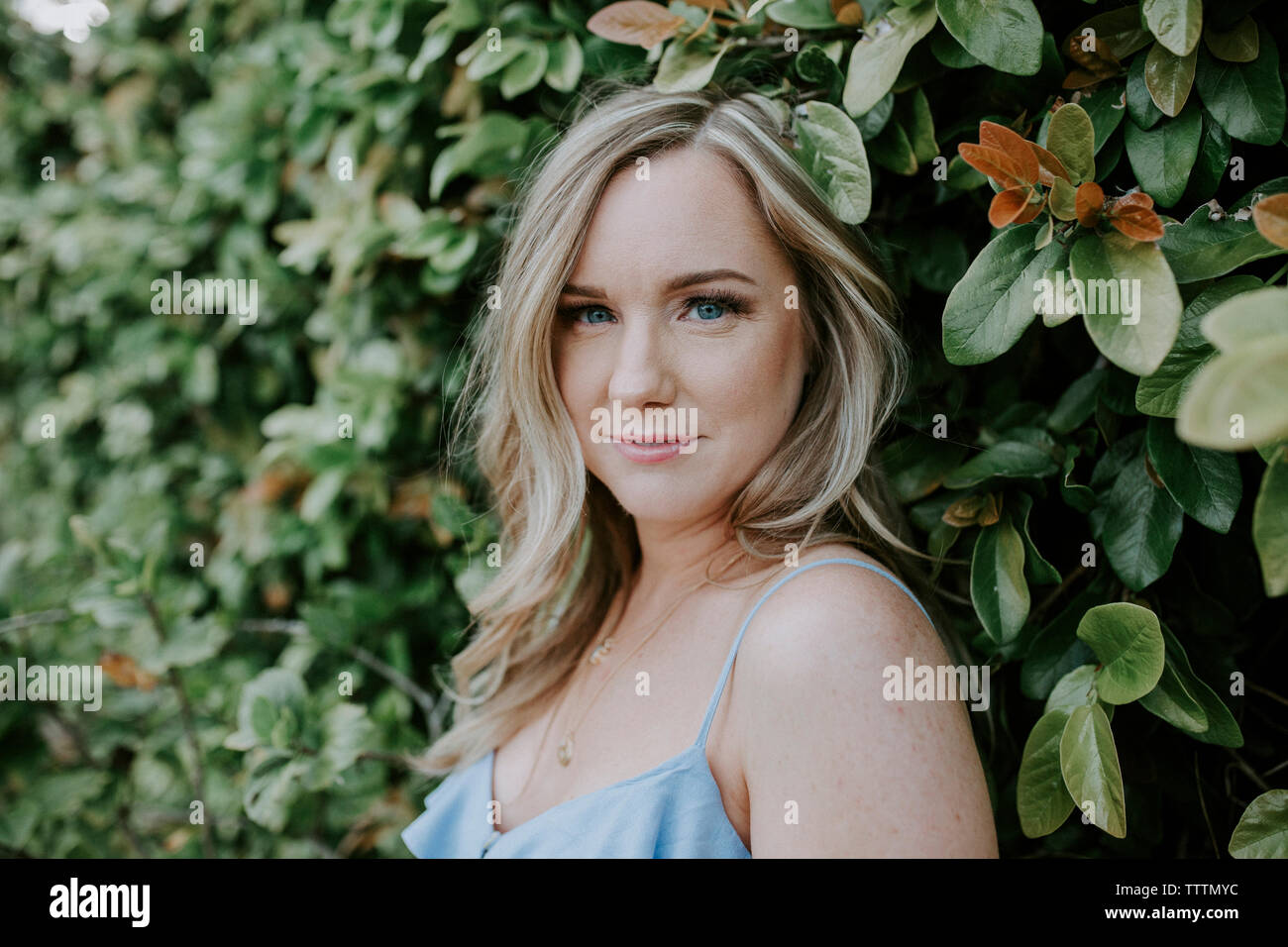 Portrait smiling blond woman park hi-res stock photography and images ...
