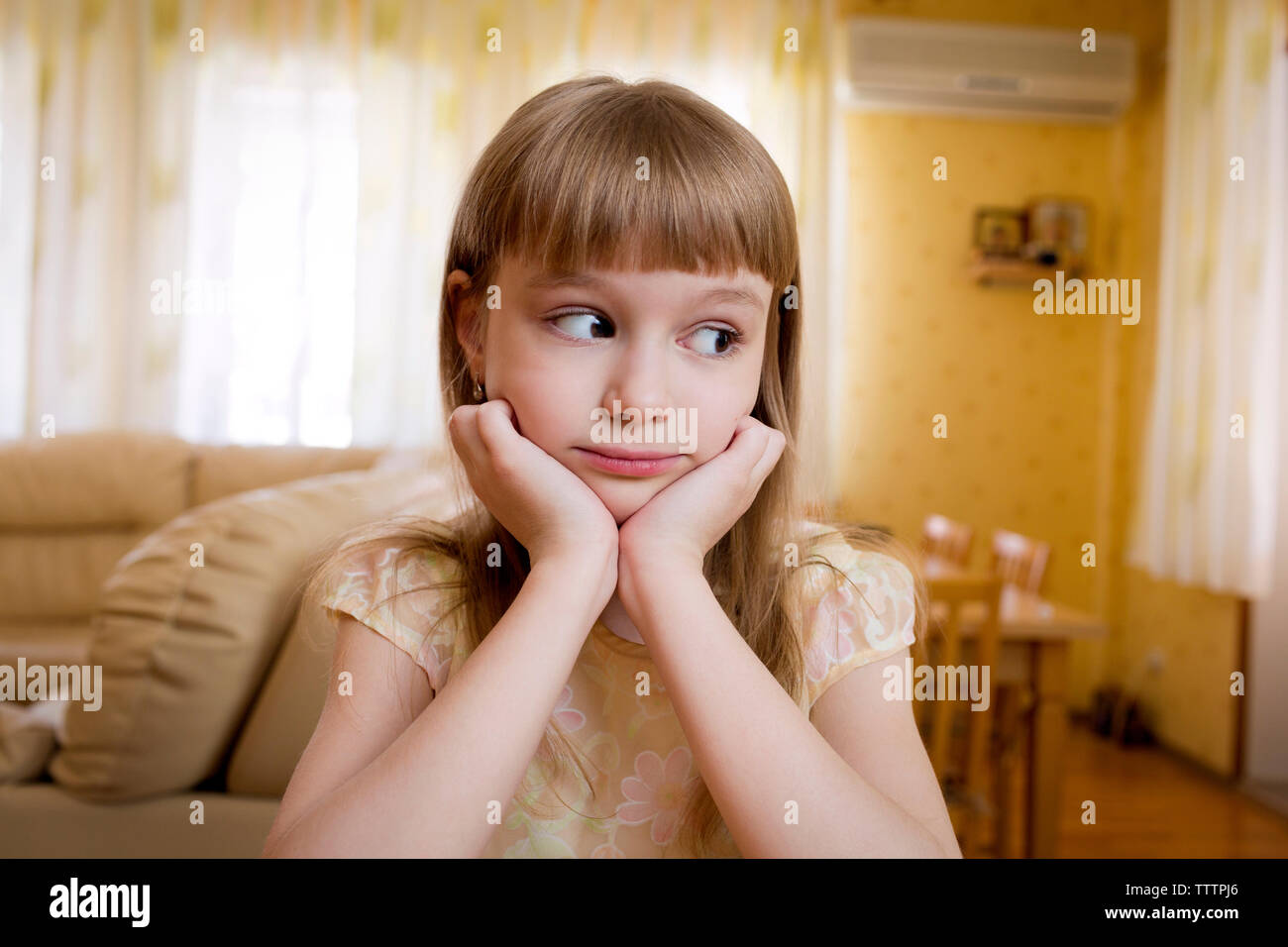 Girl sitting on hands hi-res stock photography and images - Alamy