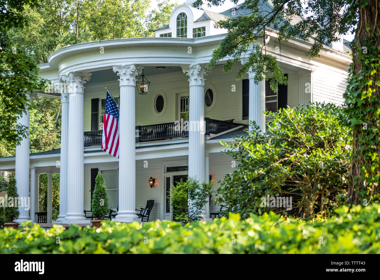 The Charters-Smith House on historic Green Street in Gainesville, Georgia is a neo-classical style residence (now home to a business) built in 1906. Stock Photo