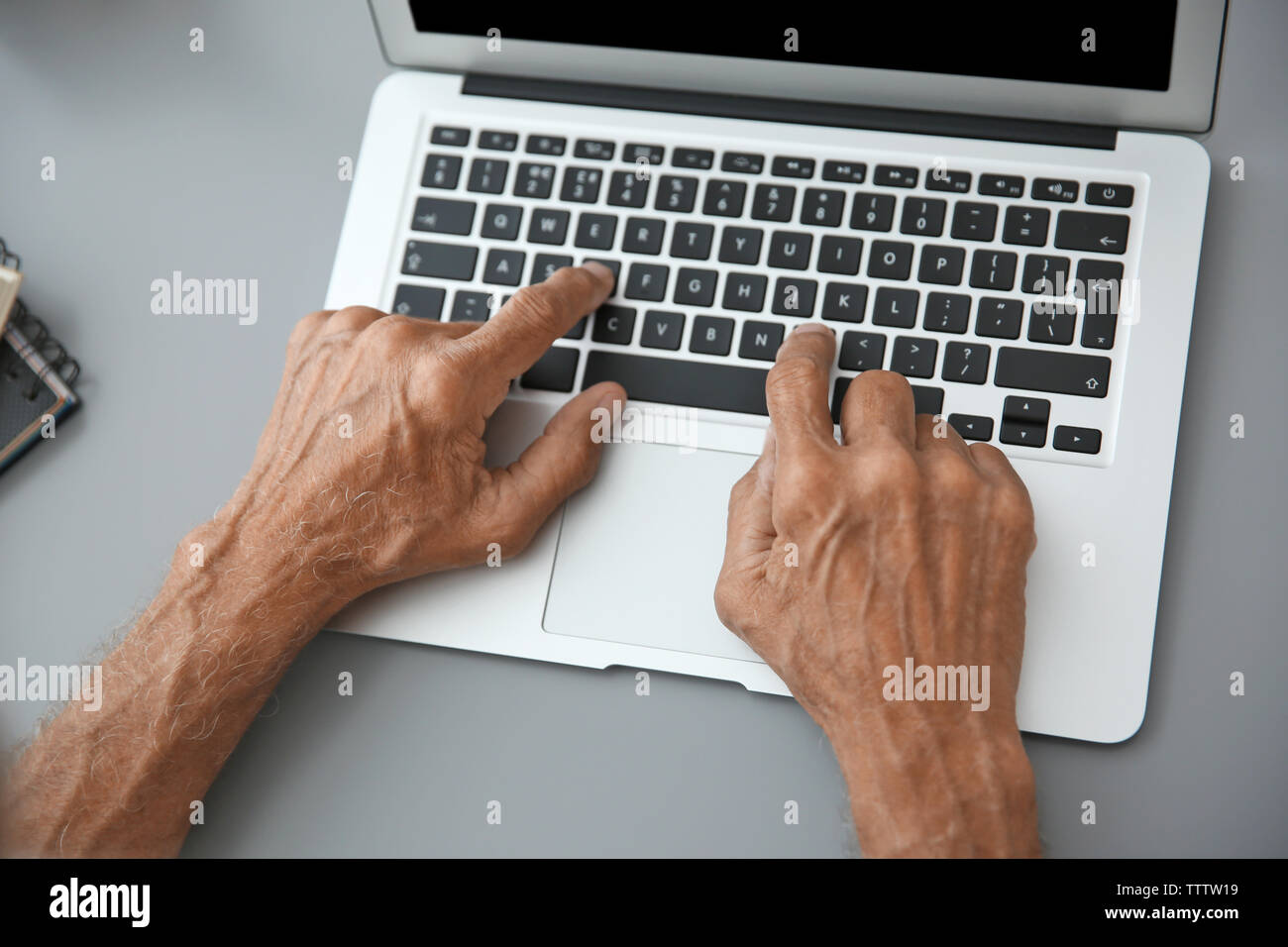 Hands senior man typing hi-res stock photography and images - Alamy