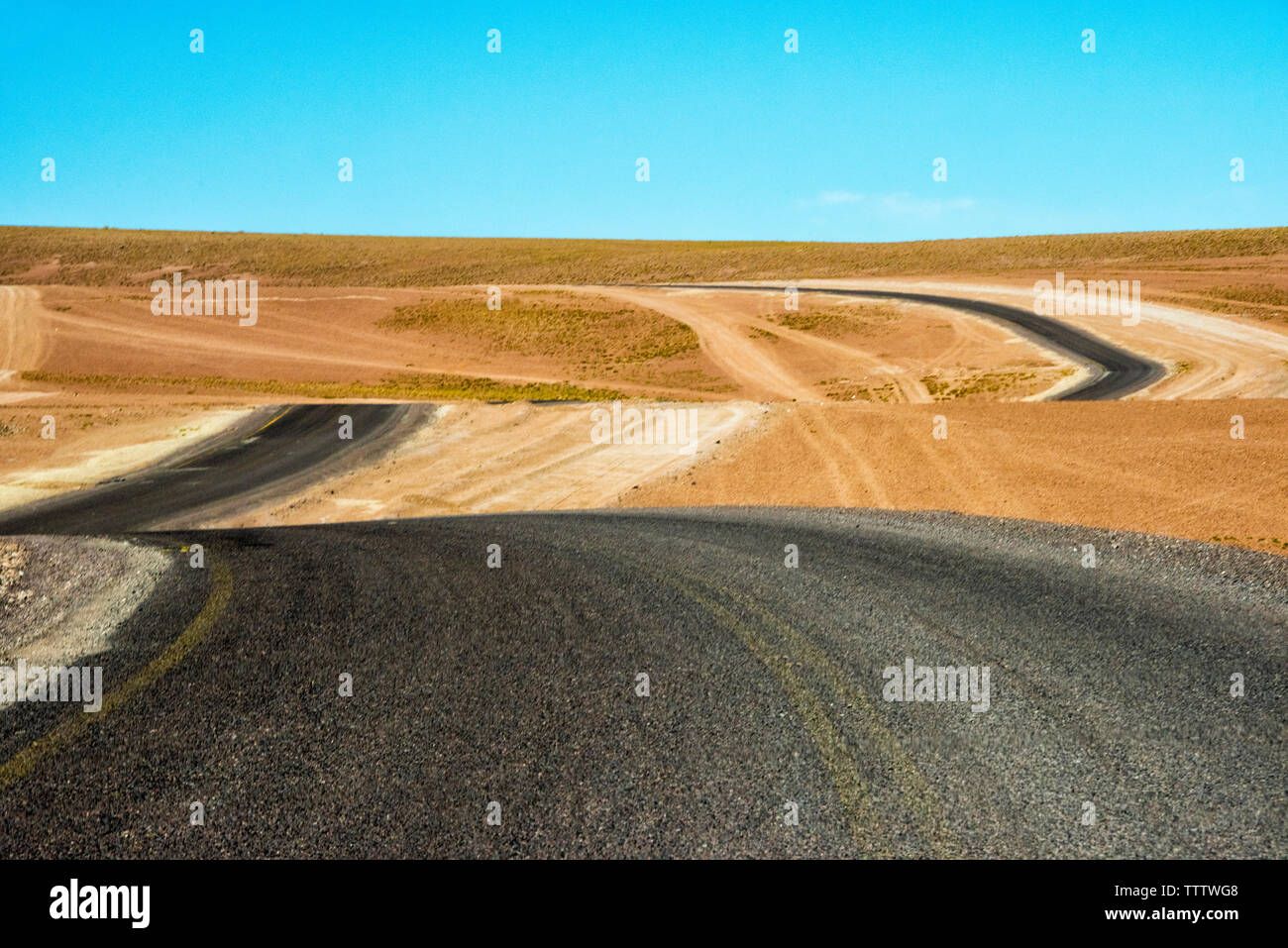 Winding road in the desert, Potosi Department, Bolivia Stock Photo