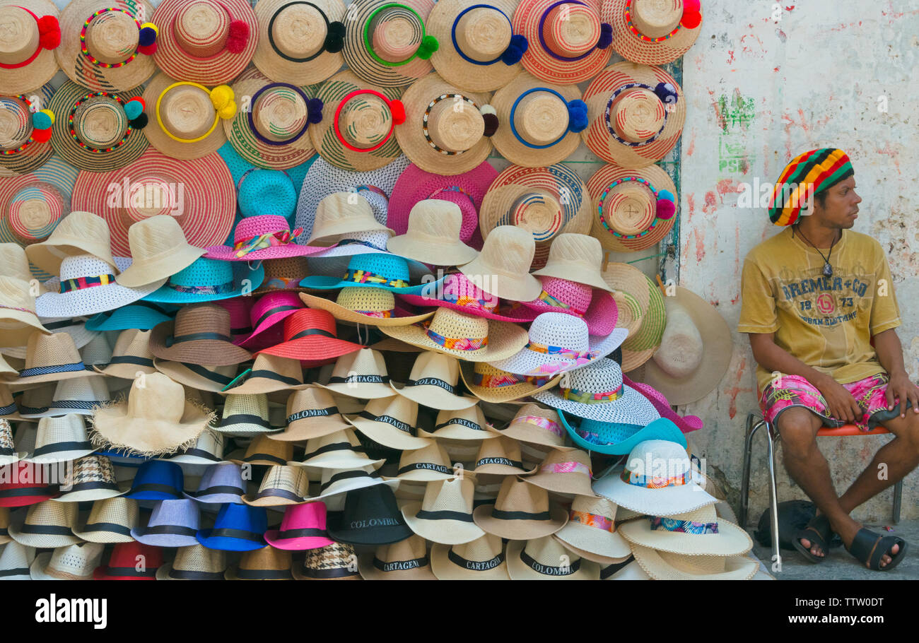 Vendor selling hat on the street in the old town, Cartagena, UNESCO World Heritage site, Bolivar Department, Colombia Stock Photo