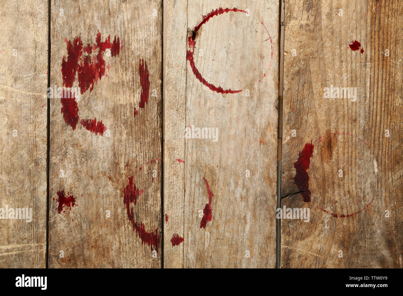 Red wine stains on wooden background Stock Photo - Alamy