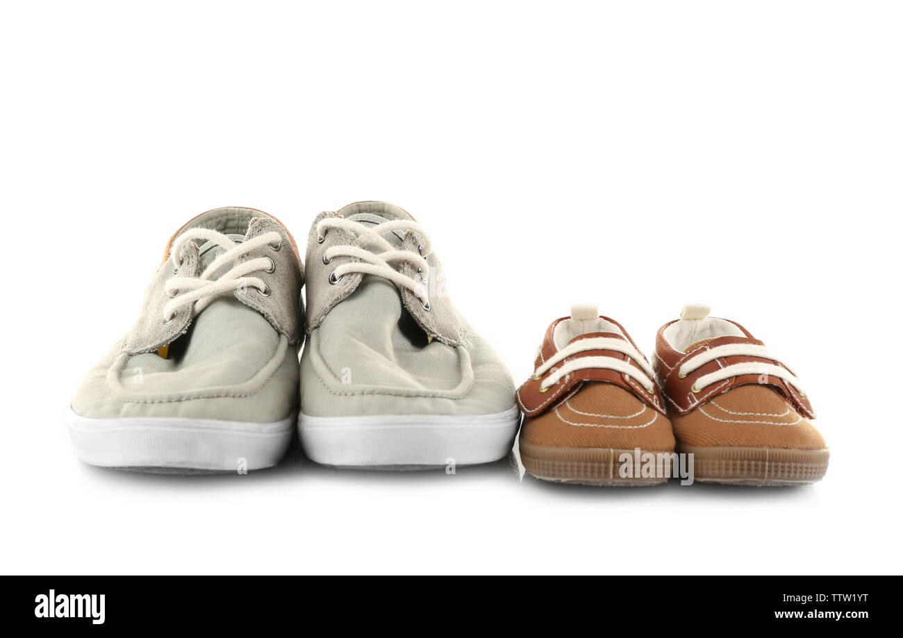 Family concept. Shoes for father and son on white background Stock