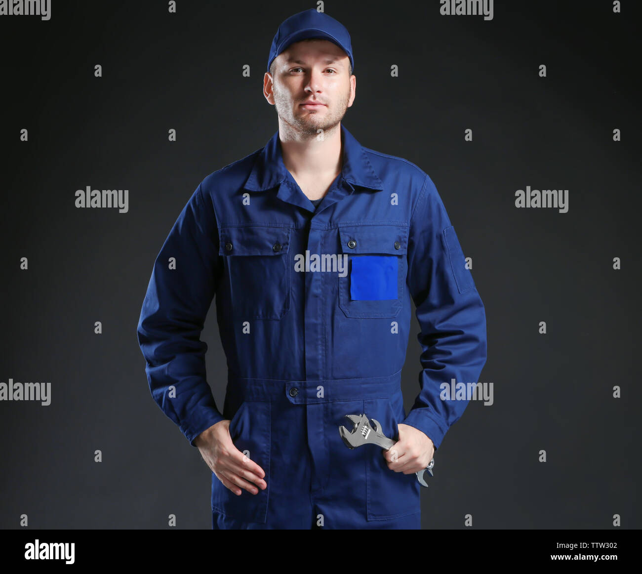Black male mechanic standing hi-res stock photography and images - Alamy