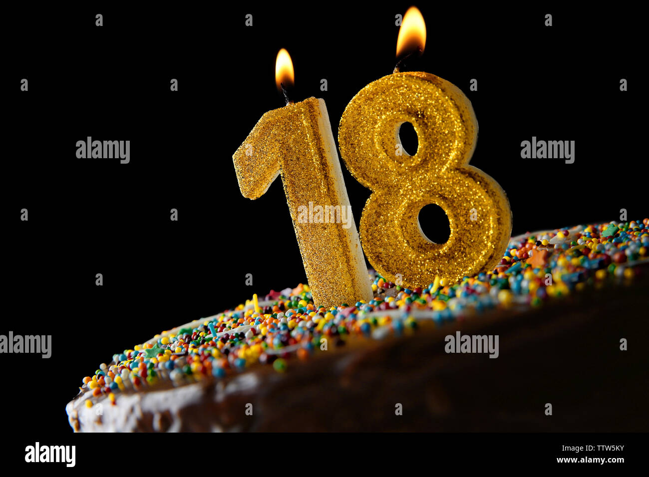 Birthday cake with burning candles Stock Photo - Alamy