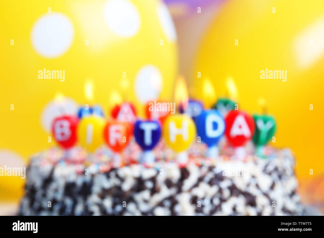 Blurred Birthday cake on balloons background Stock Photo - Alamy
