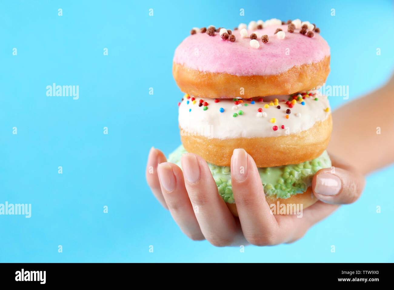 Female hand stack hi-res stock photography and images - Alamy