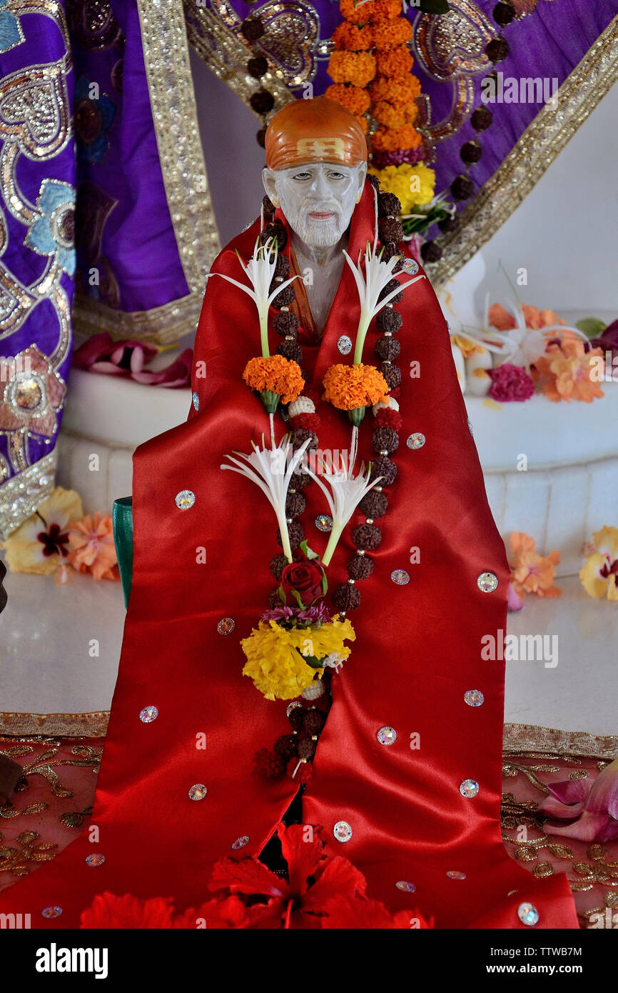 Marble idol of Sai Baba in the Temple at Sai Dwarka, Dapoli, Maharashtra, India Stock Photo