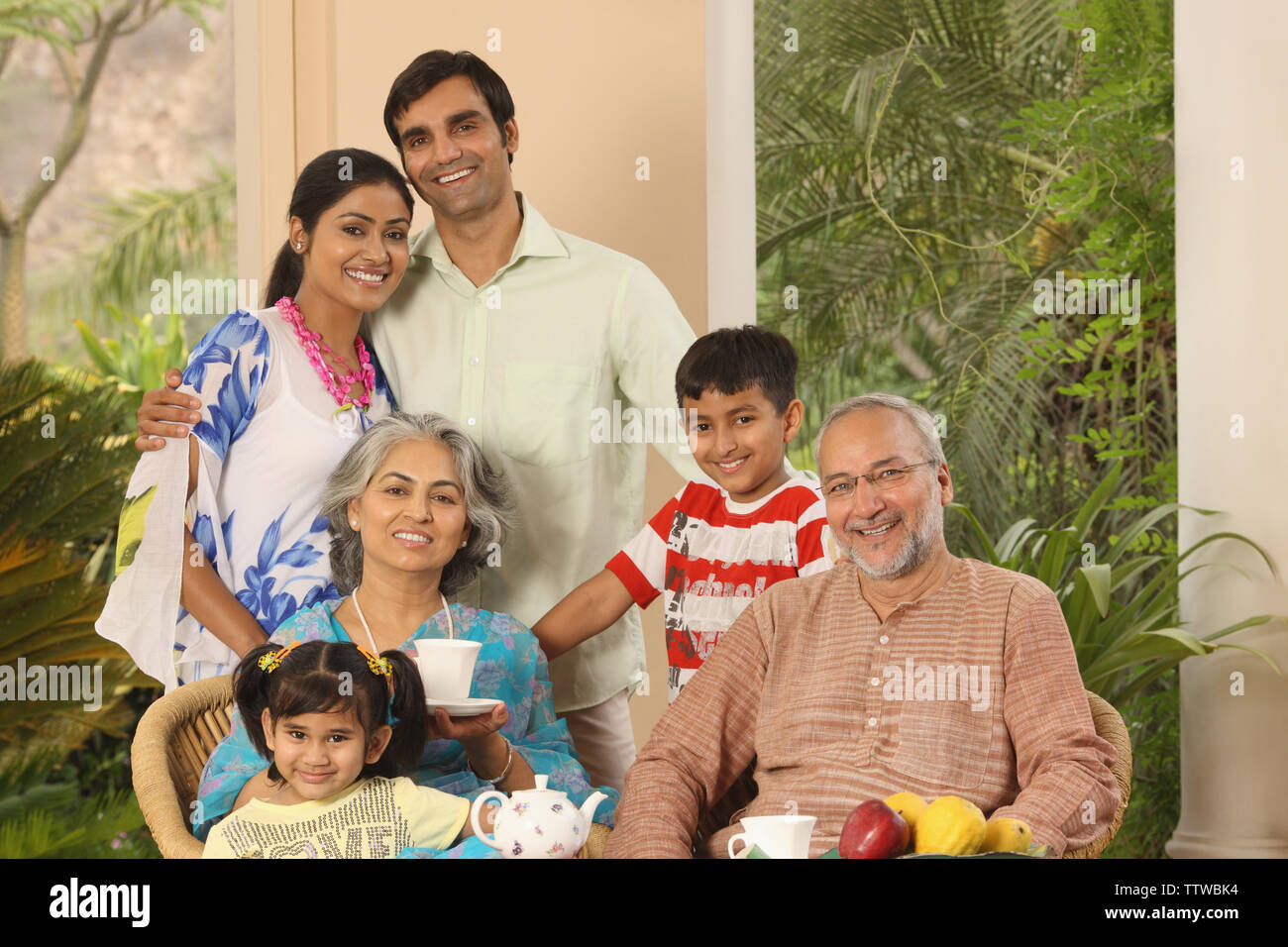 Family at a breakfast table Stock Photo - Alamy