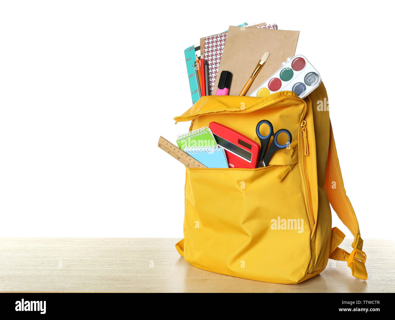 Yellow school backpack isolated on white Stock Photo