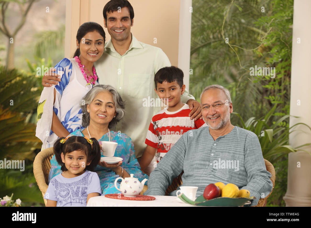 Family at a breakfast table Stock Photo - Alamy