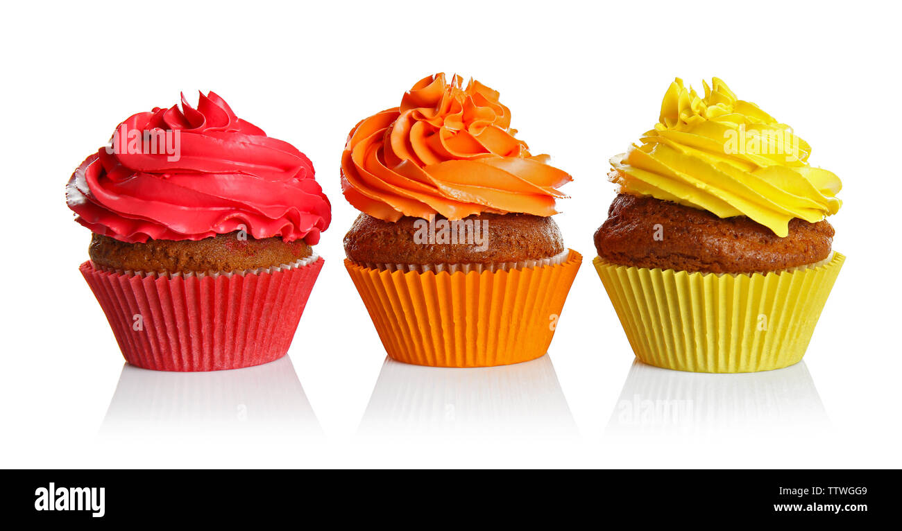 Fresh tasty cupcakes isolated on white Stock Photo
