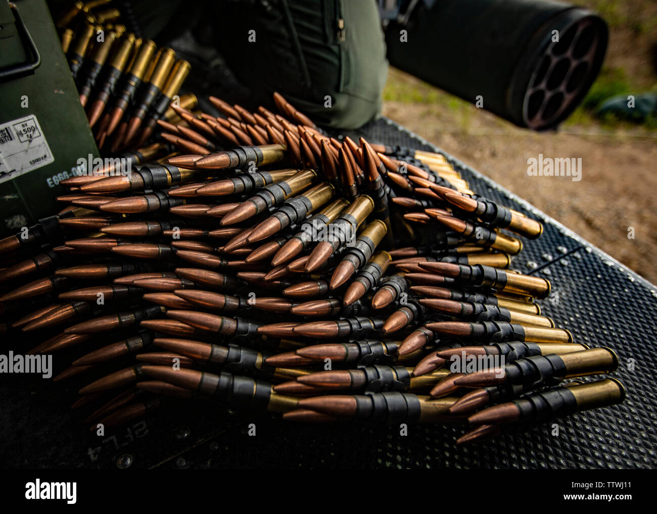 A belt of M2 .50 caliber ammunition lays on a UH-1Y Venom helicopter with Marine Light Attack Helicopter Squadron 775, Marine Aircraft Group 41, 4th Marine Aircraft Wing, during a live-fire event at Cold Lake Air Weapons Range, Alberta, Canada, June 15, 2019, in support of Sentinel Edge 19. The Marine Reserve plays a critical component to the Marine Corps’ Total Force, and training such as SE19 helps ensure Reserve units combat effectiveness and proficiency for world-wide deployment. (U.S. Marine Corps photo by Lance Cpl. Jose Gonzalez) Stock Photo