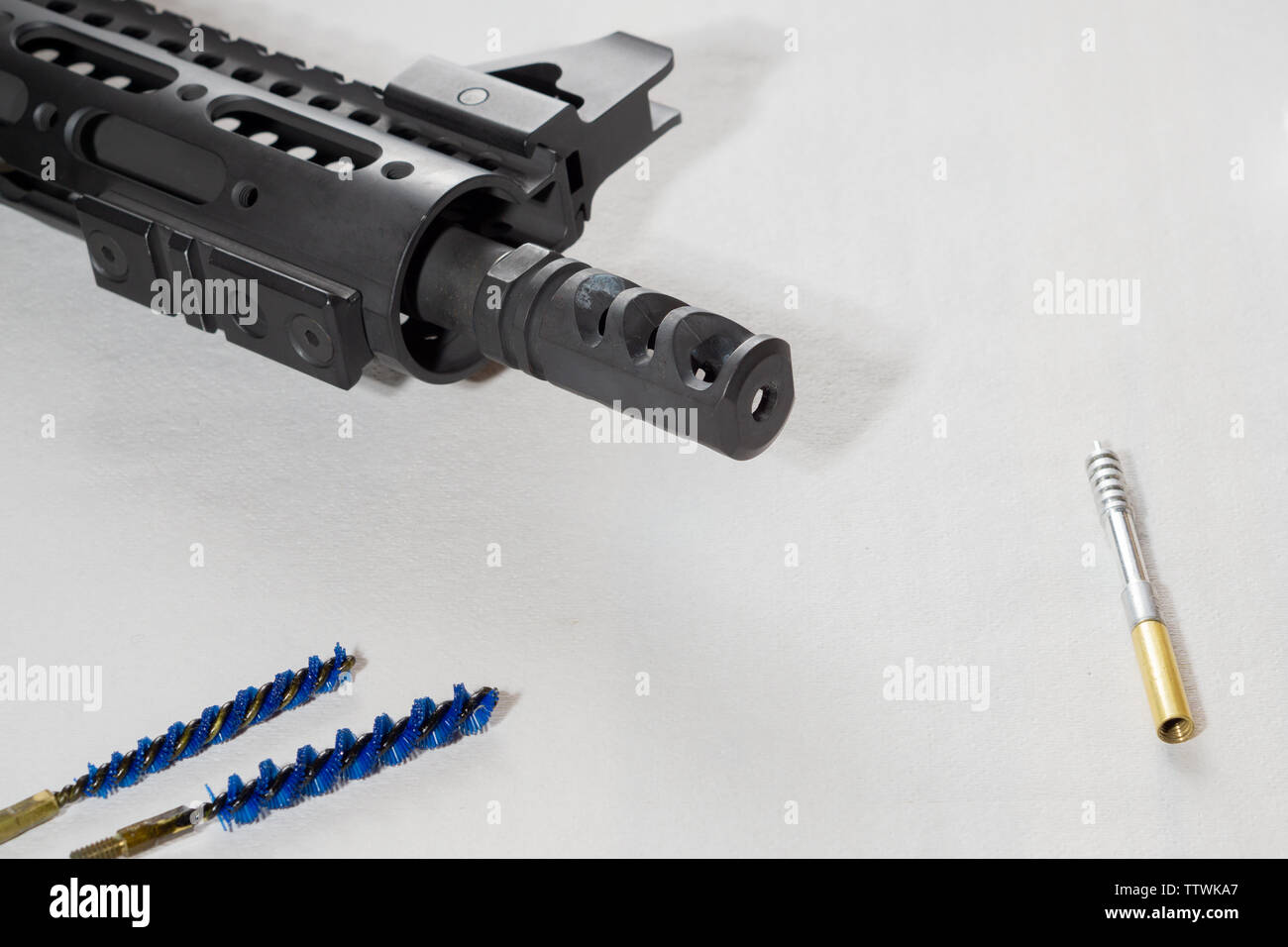 Gunsmith cleaning gun rifle assemble maintenance. White background