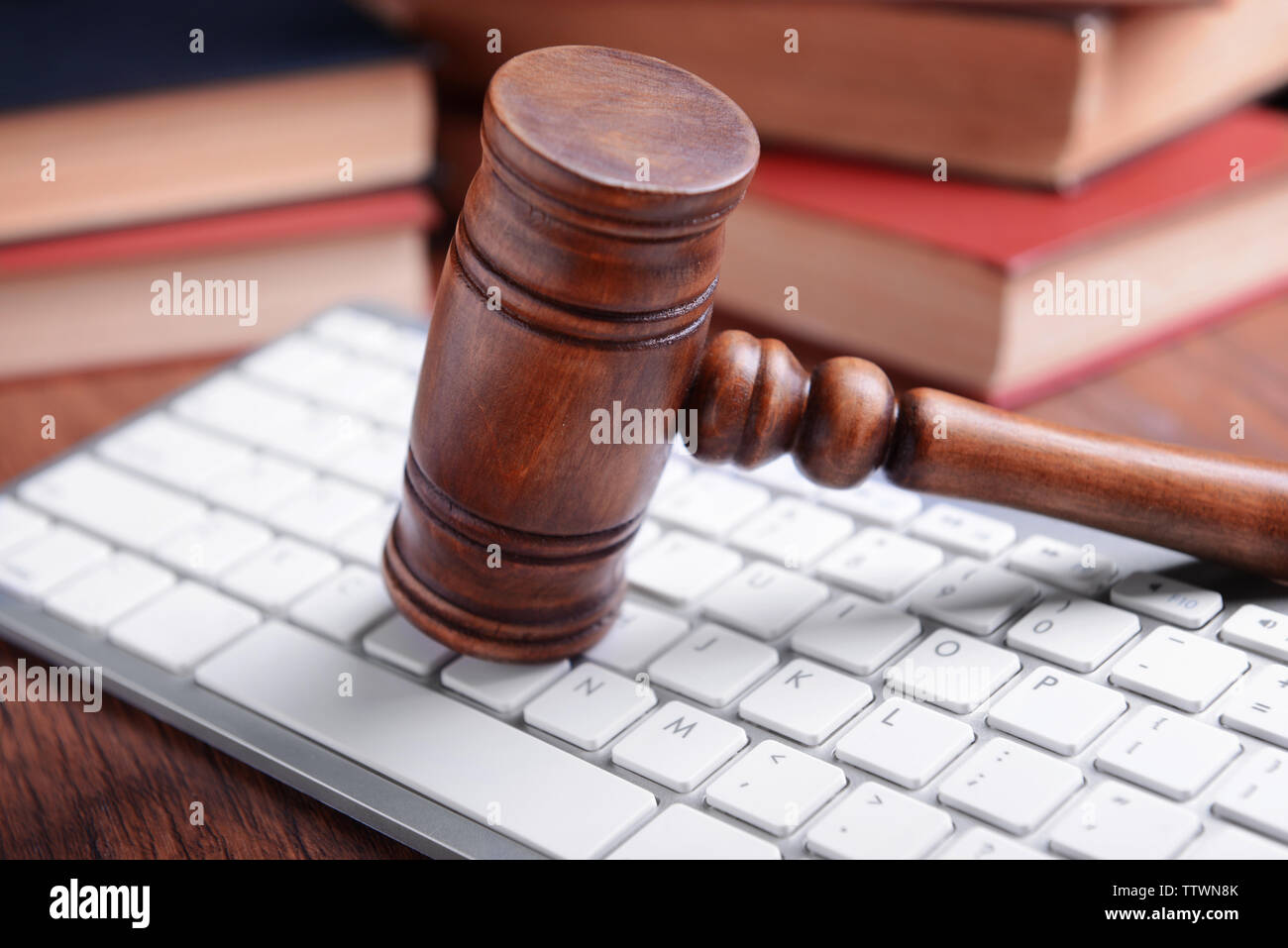 Wooden gavel and keyboard on desk Stock Photo - Alamy