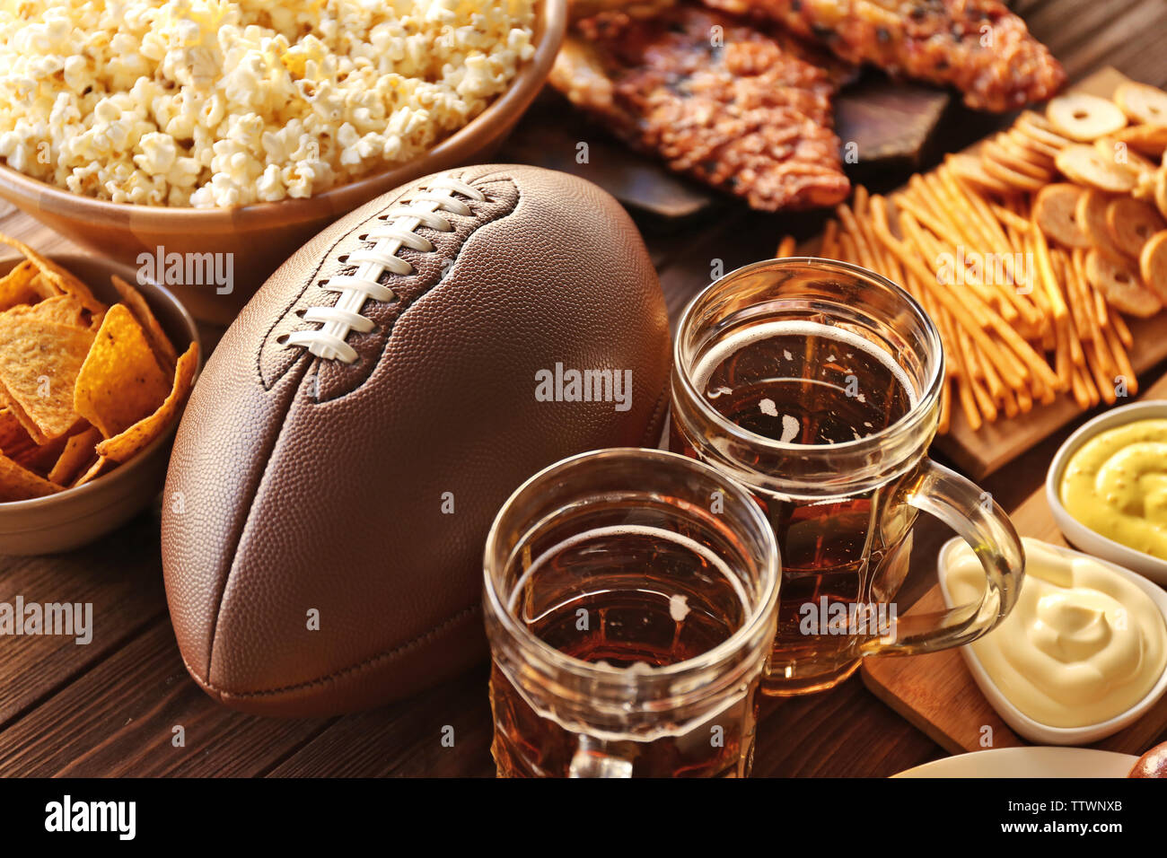 Perfect Rugby Snacks Table full of tasty snacks and beer prepared for watching rugby on TV ...