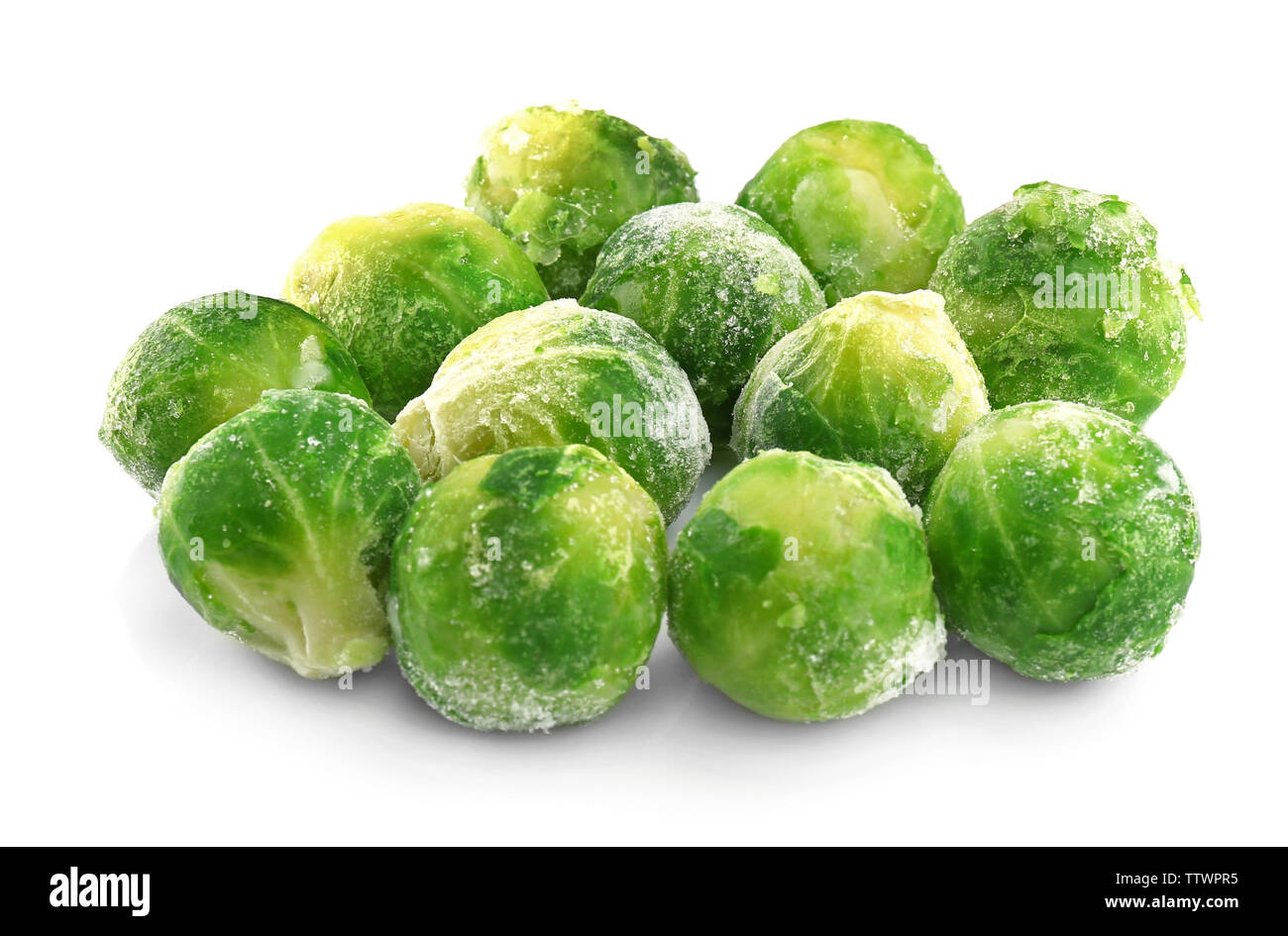 Frozen Brussels sprout isolated on white Stock Photo Alamy
