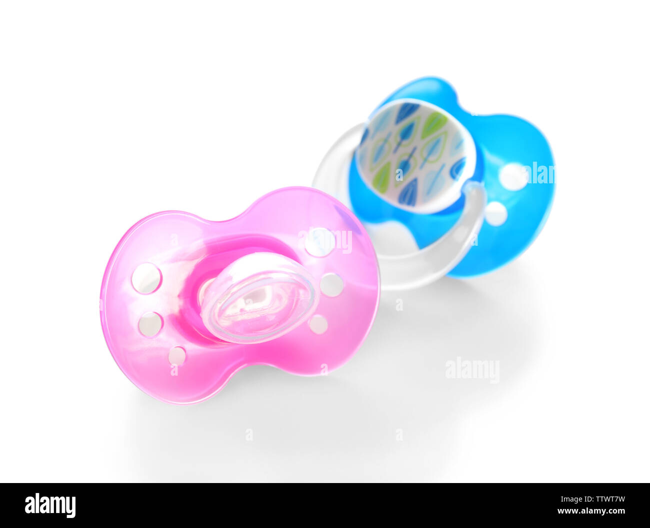 Baby pacifiers on white background Stock Photo