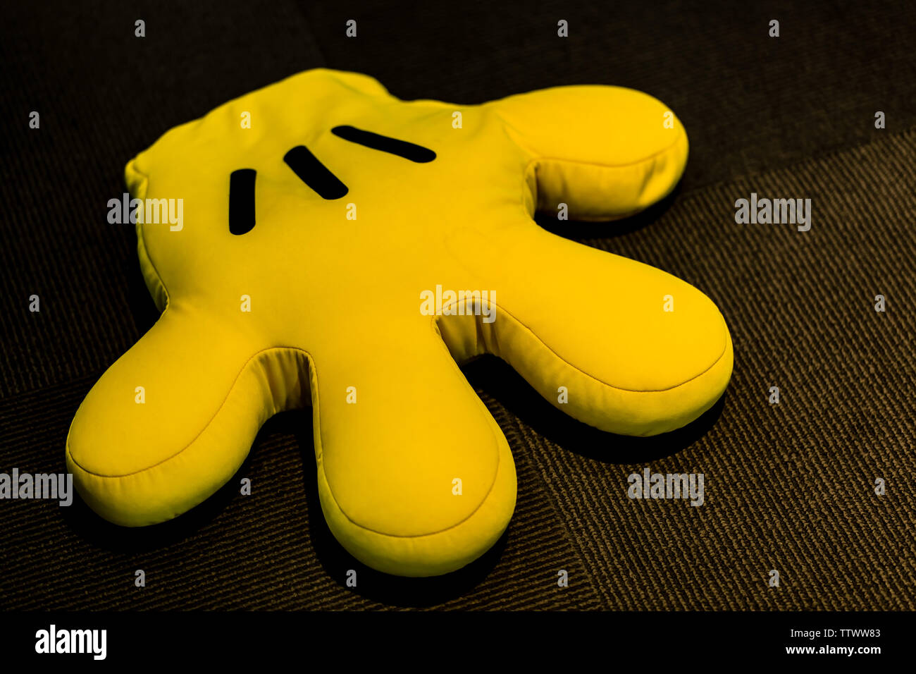 Singapore-20 AUG 2017:yellow color Disney mickey mouse glove toy ...