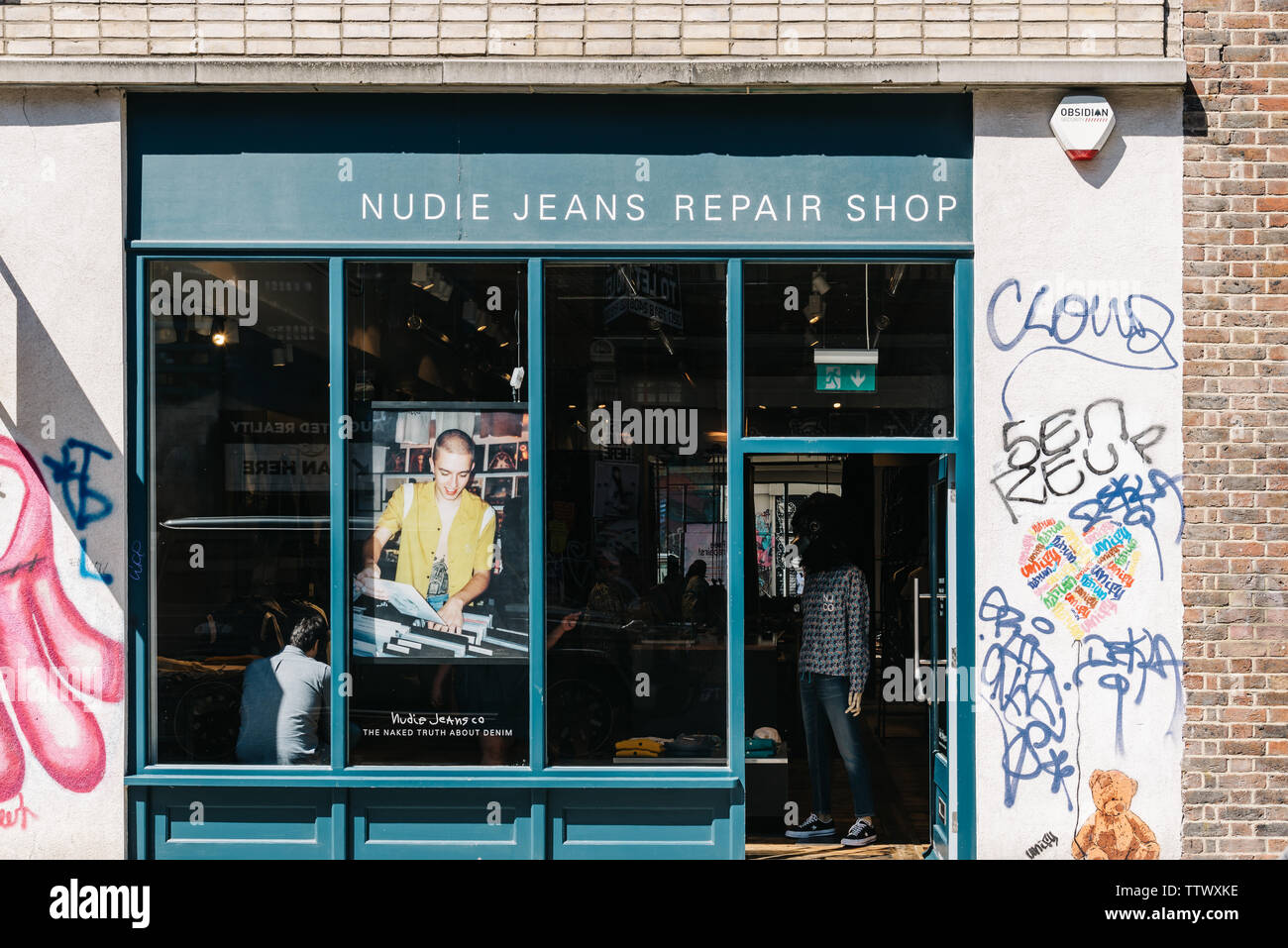 London, UK - May 14, 2019: Nudie Jeans repair shop storefront in Brick Lane  area, Shoreditch Stock Photo - Alamy