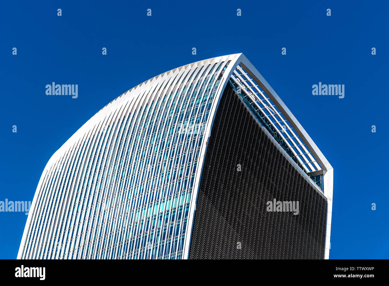 London, UK - May 14, 2019: Low angle view of 20 Fenchurch skyscraper in London agaisnt blue sky. Also known as Walkie Talkie building Stock Photo